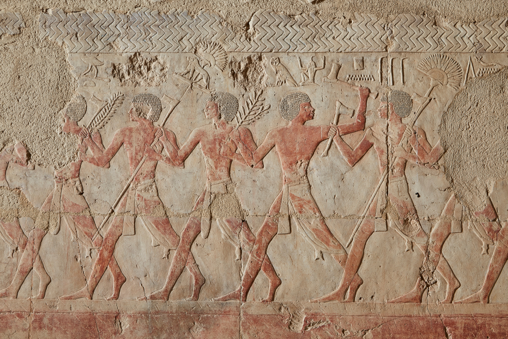 scene from the wall of Queen Hatshepsuts temple at Deir El Bahari