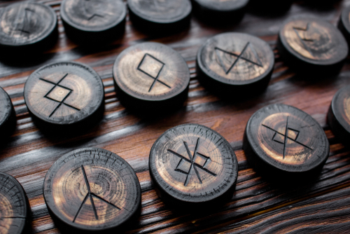 Set of anglo-saxon runes carved in wood