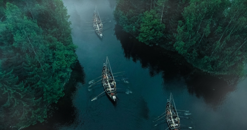 Viking Ships Moving up a River