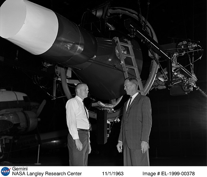 Neil Armstrong in front of Gemini simulator